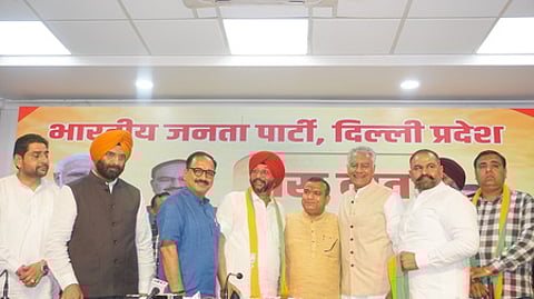 தில்லியில் பாஜகவில் இணைந்த பிற கட்சியினா்