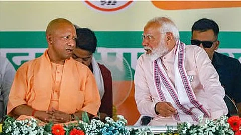 பிரதமா் நரேந்திர மோடி, முதல்வா் யோகி ஆதித்யநாத்.