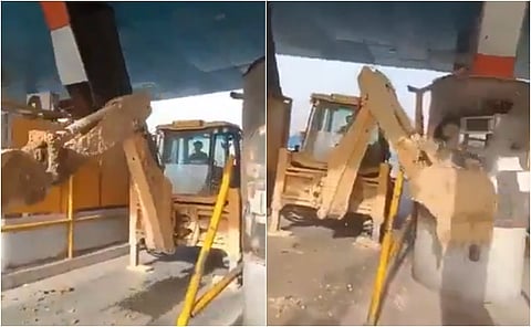 கட்டணம் கேட்டதால் சுங்கச் சாவடியை இடித்த புல்டோசர் ஓட்டுநர்!