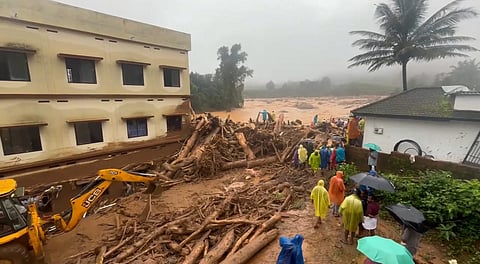 Rescue operation underway after landslides in the hilly areas near Meppadi, in Wayanad district,