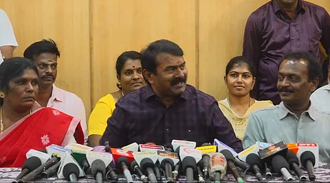 மதுரையில் செய்தியாளர்களுக்கு பேட்டியளிக்கும் சீமான்.