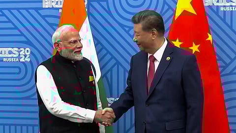 எல்லையில் அமைதிக்கு முன்னுரிமை: பிரதமா் மோடி-சீன அதிபா் ஷி ஜின்பிங் உறுதி