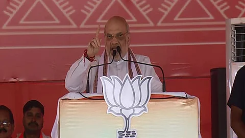 பொதுக்கூட்டத்தில் உரையாற்றும் அமித் ஷா