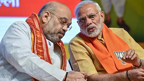 மத்திய அமைச்சர் அமித் ஷா - பிரதமர் நரேந்திர மோடி