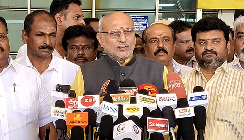சி.பி.ராதாகிருஷ்ணன்.