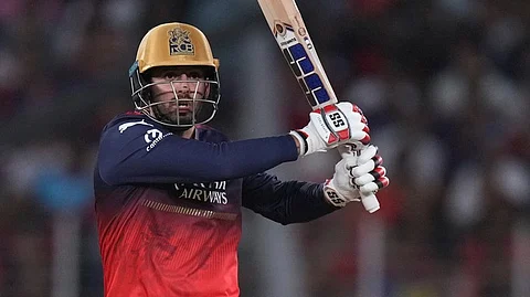Royal Challengers Bengaluru's Jitesh Sharma plays a shot during the Indian Premier League cricket final match between Punjab Kings and Royal Challengers Bengaluru at Narendra Modi Stadium in Ahmedabad