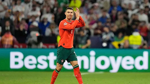 Portugal's Cristiano Ronaldo applauds as he leaves the pitch after being substituted during the Nations League semifinal soccer match between Portugal and Germany