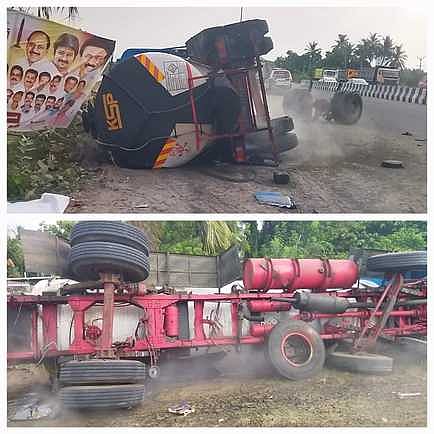 விபத்துக்குள்ளாகி கவிழ்ந்து கிடந்த அமில லாரி.