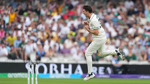 Australia's captain Pat Cummins celebrates the dismissal of South Africa's captain Temba Bavuma on day two of the World Test Championship final