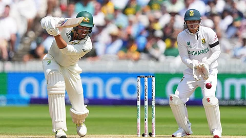 Australia's Mitchell Starc plays a shot on day three of the World Test Championship final between South Africa and Australia at Lord's cricket ground in London