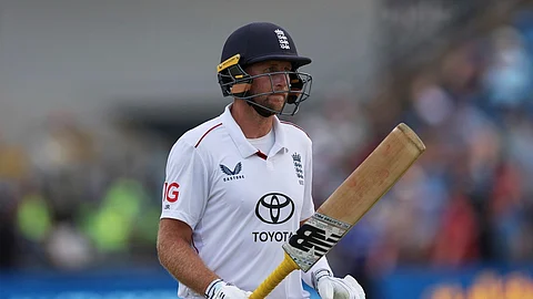 England's Joe Root walks off the field after losing his wicket on day two of the first cricket test match between England and India