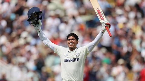 Captain Shubman Gill celebrates after scoring a century