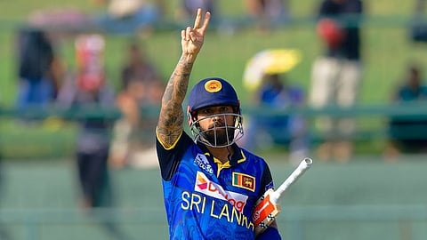 Kusal Mendis celebrates after scoring a century