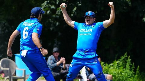 The Italian team celebrates victory...