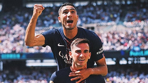 PSG players celebrate after scoring a goal.