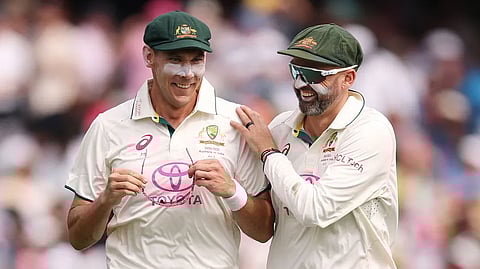 Scott Boland, Nathan Lyon.