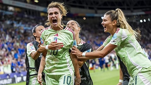 Italy's Cristiana Girelli (10) celebrates with teammates after scoring their second goal during the Women's Euro 2025 quarterfinals