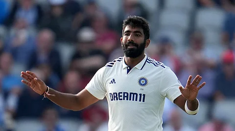 India's Jasprit Bumrah reacts after deliver a ball during the second day of the fourth cricket test match between England and India at Emirates Old Trafford, Manchester