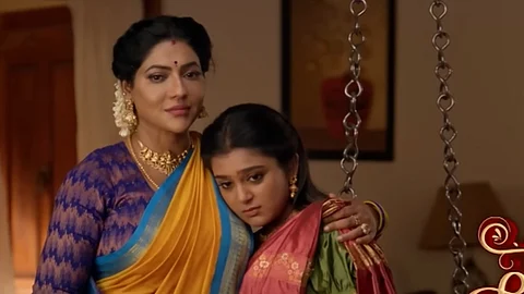 மகளே என் மருமகளே தொடர் போஸ்டர்