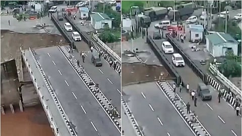 ராணுவத்தினர் கட்டிய பாலத்தின் வழியே செல்லும் வாகனங்கள்