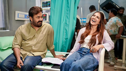 Malavika Mohan with Mohanlal.