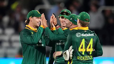 South Africa's Keshav Maharaj, second right, celebrates with teammates second ODI series cricket match between England and South Africa,