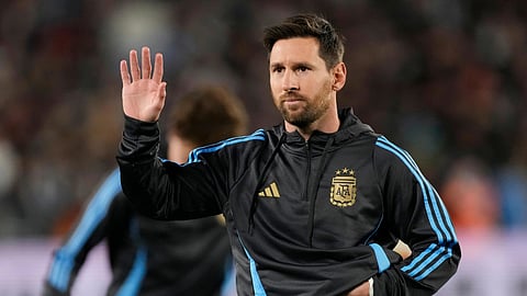Argentina's Lionel Messi waves during warmups prior to a World Cup 2026 qualifying soccer match against Venezuela at the Monumental stadium in Buenos Aires, Argentina