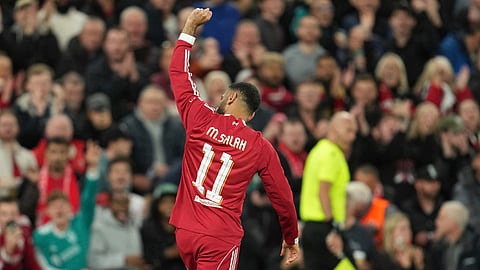 Liverpool's Mohamed Salah celebrates after scoring his side's second goal during the Champions League Anfield stadium in Liverpool, England,