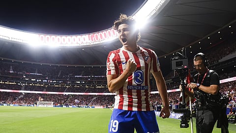 Julian Alvarez celebrates after scoring a goal.