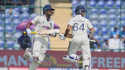 India's Yashasvi Jaiswal and Sai Sudharsan run between the wickets to score on the first day of the second cricket test match between India and West Indies at Delhi.