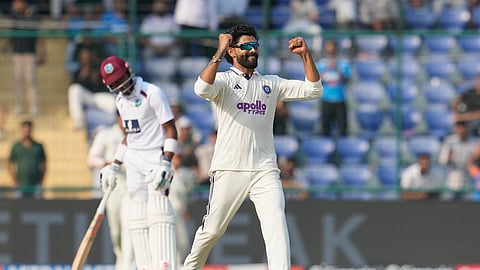 Ravindra Jadeja celebrates after taking a wicket