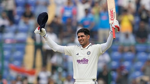 India's captain Shubman Gill celebrates after scoring a century on the second day of the second cricket test match between India and West Indies.