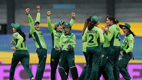 Pakistan's team members celebrate the dismissal of England's Sophia Dunkley during the ICC Women's Cricket World Cup match.