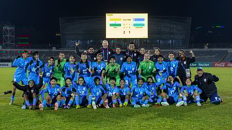 The Indian U-17 women's team celebrates their victory.