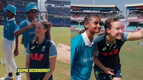 An Indian girl braided a braid for an Australian player.