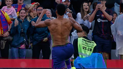 Barcelona's Ronald Araujo celebrates after scoring during a La Liga soccer match between Barcelona and Girona in, Spain.