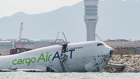 The cargo aircraft that skidded off a Hong Kong airport runway is seen on Monday.