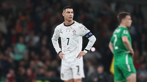 Portugal's Cristiano Ronaldo, center, reacts during a World Cup 2026 group F qualifying soccer match between Ireland and Portugal in Dublin.