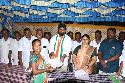 ஆழ்வாா்திருநகரி பேரூராட்சியில்
34 பேருக்கு இலவச வீட்டுமனைப் பட்டா