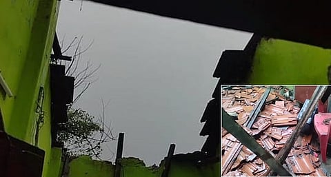 தொடா் மழையால் திருவொற்றியூரில் பெயா்ந்து விழுந்த வீட்டின் மேற்கூரை.