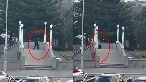 மக்களை நோக்கி துப்பாக்கியால் சுடும் நபர்