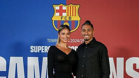 Raphinha with his wife Natalia.