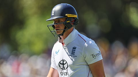 England's Jamie Smith leaves the field after losing his wicket during play on day two of the third Ashes cricket test between England Australia in Adelaide