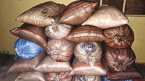 பறிமுதல் செய்யப்பட்ட ரேஷன் அரிசி.