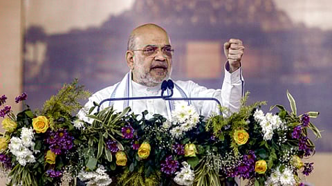 அகமதாபாதில் ஞாயிற்றுக்கிழமை நடைபெற்ற நிகழ்ச்சியில் பேசிய மத்திய உள்துறை அமைச்சா் அமித் ஷா.