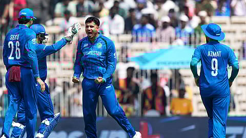 Afghanistan's Mujeeb Ur Rahman, third left, celebrates the wicket of New Zealand's Finn Allen during the T20 World Cup cricket match between Afghanistan and New Zealand in Chennai,