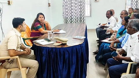 கூட்டத்தில் பங்கேற்ற சாா் ஆட்சியா் எம். பூஜா உள்ளிட்டோா்.