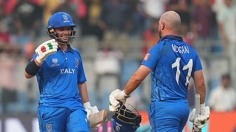 The Italian team's opening players celebrate their victory