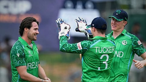 The Irish team celebrates their victory.
