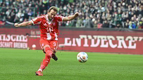 Bayern's Harry Kane scores his side's second goal during the German Bundesliga soccer match between Werder Bremen and Bayern Munich, in Bremen, Germany, Saturday, Dec. 14, 2026. (Carmen Jaspersen/dpa via AP)